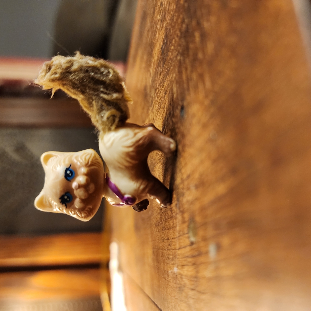 Adorable Tan Cat Toy with Purple Collar